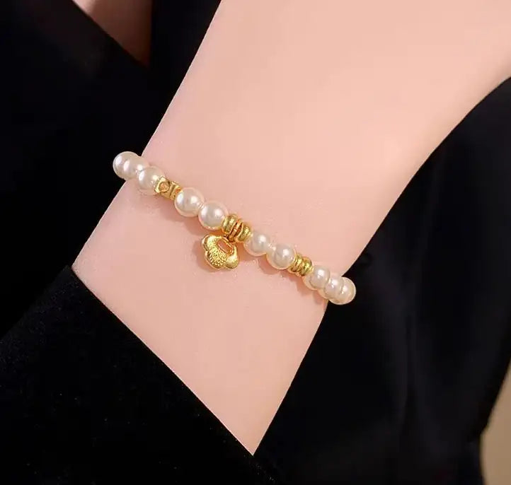 Modern pearl bracelet| Gold-Plated Pearl Bangle - Effortless Elegance