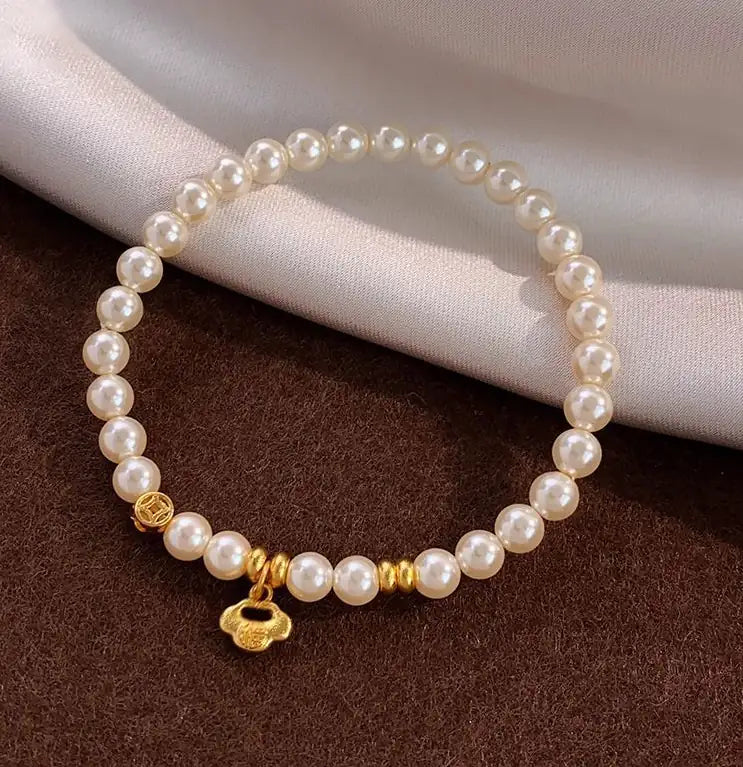 Modern pearl bracelet| Gold-Plated Pearl Bangle - Effortless Elegance